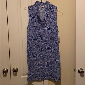 Women’s sleeveless dress with a ruffle v-neck